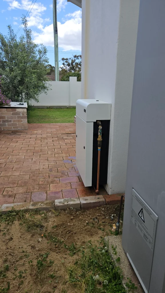 Vortex Pro 3 mounted at the corner of a Bunbury home beside a paved courtyard