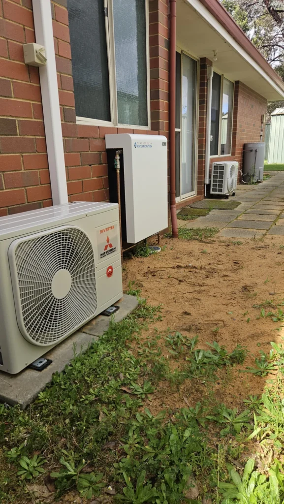 Vortex Pro 3 installed alongside air conditioning units on the service side