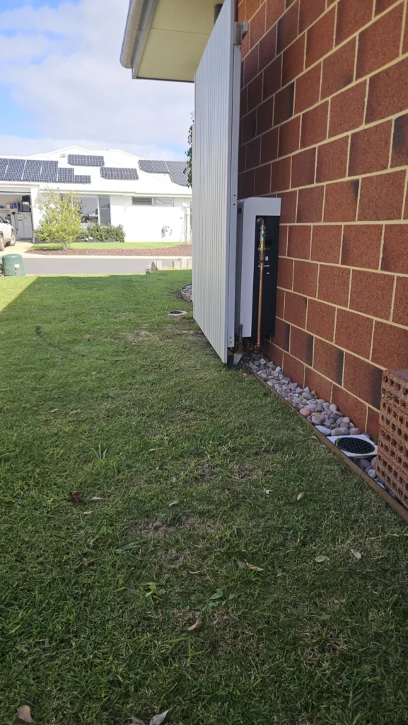 Side view of the Vortex Pro 3 mounted flat against the brick wall