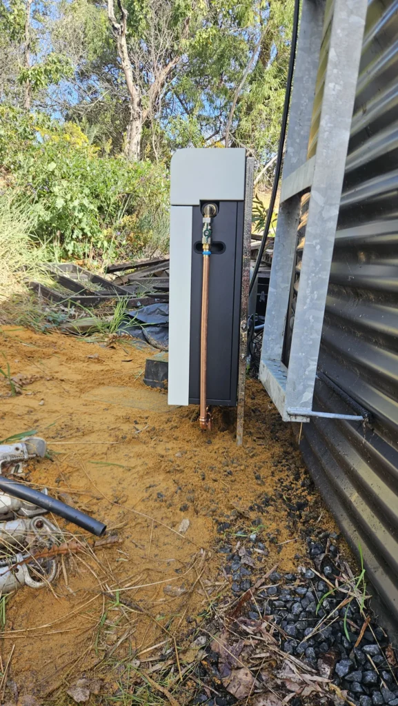Ultra V Pro 3 mounted on a custom stainless steel bracket beside a rainwater tank in Yallingup