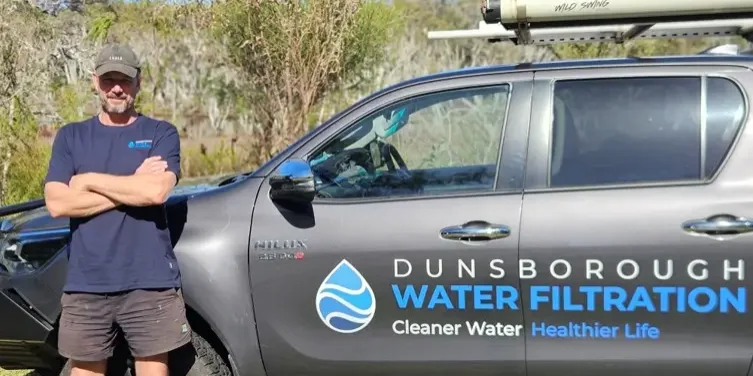 Danny Tuffin from Dunsborough Water Filtration standing with his ute